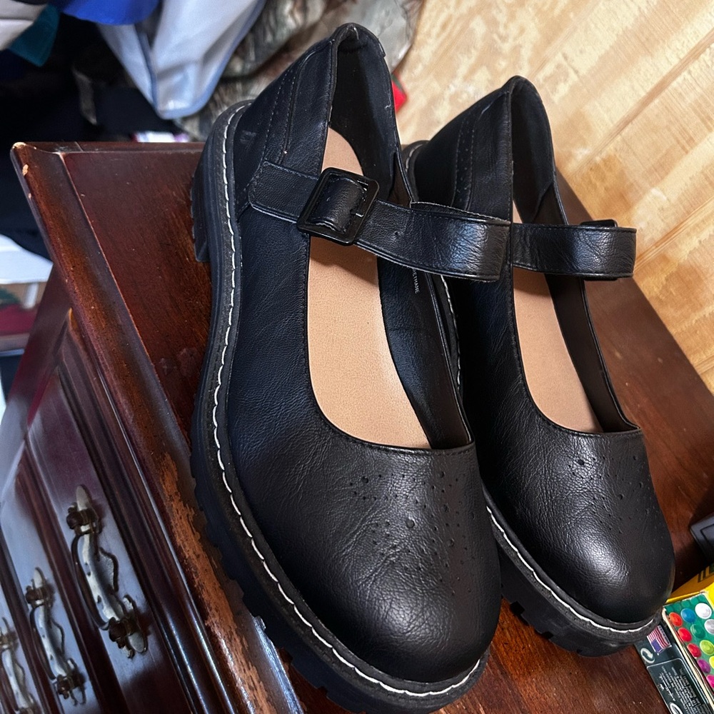 Black buckle Mary Jane’s